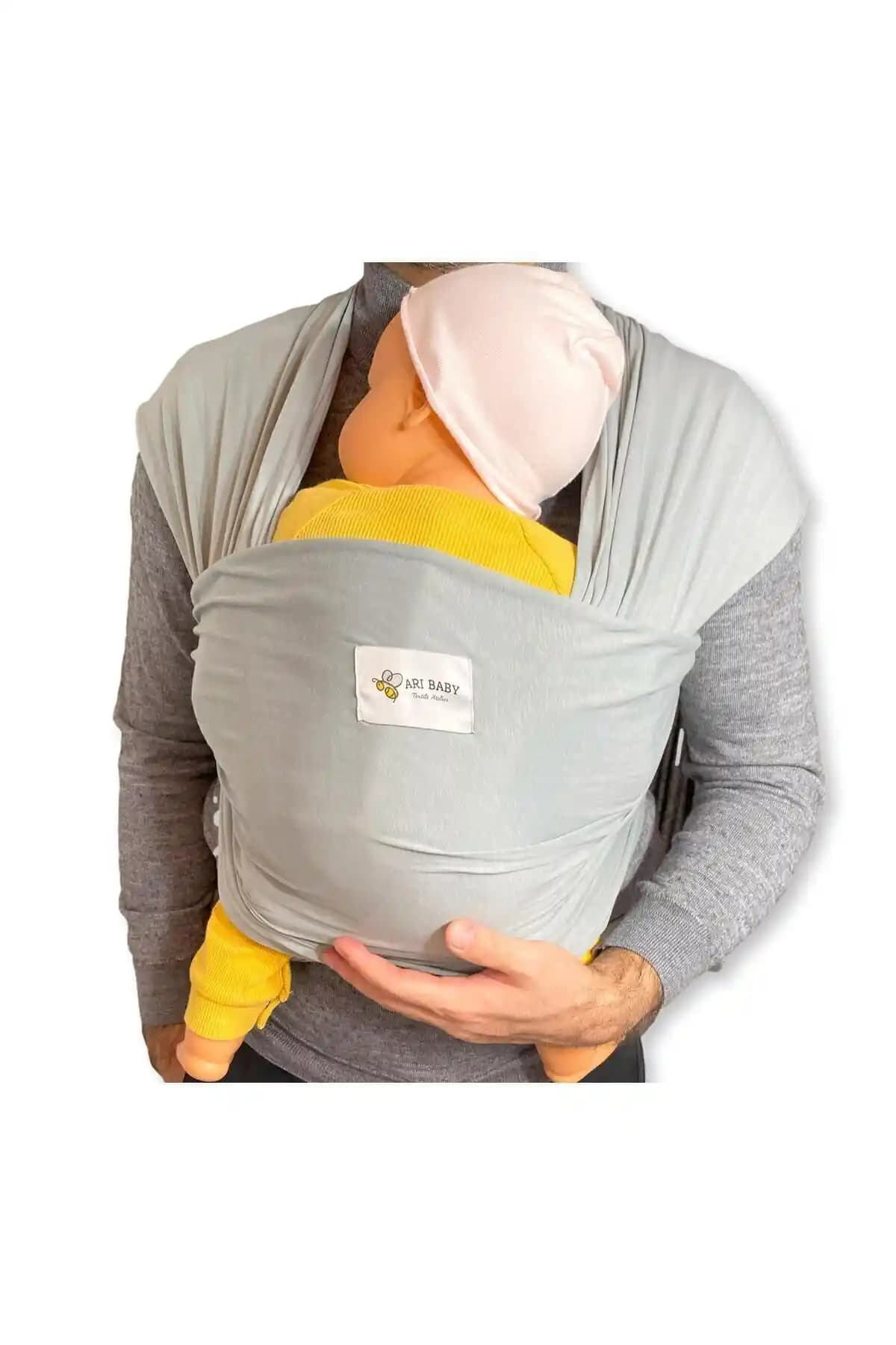 Ari Baby Textile Atelier Bebek Sling: Güvenli ve Konforlu Bebek Taşıma Çözümü
